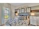 Comfortable bedroom featuring modern decor, large windows, and ample natural light at 544 Verdi Drive Dr, Summerville, SC 29486