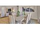 Elegant dining area adjacent to a living room, showcasing modern decor and ample seating at 544 Verdi Drive Dr, Summerville, SC 29486