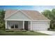 Charming one story home featuring light green siding and a two car garage at 544 Verdi Drive Dr, Summerville, SC 29486