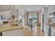 Bright kitchen with stainless steel appliances, granite countertops, and access to a patio at 544 Verdi Drive Dr, Summerville, SC 29486