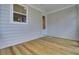 Back porch with wood flooring and partial view out the window at 617 Du Bois Dr, Johns Island, SC 29455