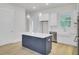 A kitchen with shaker cabinets, stainless steel appliances, a navy-blue island and pendant lighting at 617 Du Bois Dr, Johns Island, SC 29455