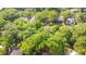Aerial view of homes surrounded by lush green trees in a neighborhood at 624 Atlantic St, Mount Pleasant, SC 29464