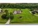 Beautiful home on expansive lot with long driveway and surrounding trees at 727 Sonny Boy Ln, Johns Island, SC 29455