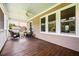 Relaxing screened back porch with ceiling fan and views of the private backyard at 727 Sonny Boy Ln, Johns Island, SC 29455