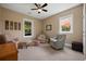 Bedroom with carpet flooring, three chairs, and a ceiling fan at 727 Sonny Boy Ln, Johns Island, SC 29455