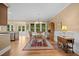 Dining room features views of the sunroom and the kitchen at 727 Sonny Boy Ln, Johns Island, SC 29455