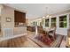 Dining room features views of the sunroom and the kitchen at 727 Sonny Boy Ln, Johns Island, SC 29455