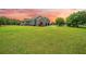 Exterior of a home showing the large, fenced backyard and screened back porch at 727 Sonny Boy Ln, Johns Island, SC 29455