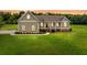 Charming home featuring a cozy front porch and well-manicured lawn at 727 Sonny Boy Ln, Johns Island, SC 29455