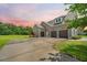 Three-car attached garage with extra parking on the large driveway at 727 Sonny Boy Ln, Johns Island, SC 29455