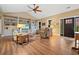 Inviting living room featuring a vaulted ceiling, bright windows, and a stylish doorway at 727 Sonny Boy Ln, Johns Island, SC 29455