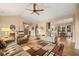 Open living area with hardwood floors, leading into the kitchen and dining room at 727 Sonny Boy Ln, Johns Island, SC 29455