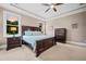 Spacious main bedroom features trey ceilings, bedside tables, and a dresser at 727 Sonny Boy Ln, Johns Island, SC 29455