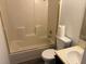 Clean bathroom features a shower-tub combo, toilet, and vanity with a sink at 7713 Suzanne Dr, North Charleston, SC 29418