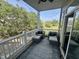 Inviting outdoor balcony with seating and a scenic view, perfect for relaxing at 81 Sandbar Ln # 28, Folly Beach, SC 29439