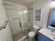 Bathroom with tiled shower with a glass door and modern vanity at 81 Sandbar Ln # 28, Folly Beach, SC 29439