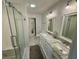 Pristine bathroom with double vanity, sleek glass shower, and neutral decor at 81 Sandbar Ln # 28, Folly Beach, SC 29439