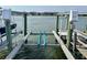 Close up of modern boat lift with new piling, with easy water access at 81 Sandbar Ln # 28, Folly Beach, SC 29439