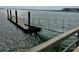 Scenic wooden dock extending into the water, ideal for boating and relaxing by the sea at 81 Sandbar Ln # 28, Folly Beach, SC 29439