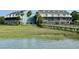 Scenic view of waterfront community buildings from the water at 81 Sandbar Ln # 28, Folly Beach, SC 29439