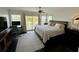 Bright main bedroom featuring a workspace, balcony, and neutral color scheme at 81 Sandbar Ln # 28, Folly Beach, SC 29439