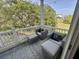 Cozy porch with comfortable seating, overlooking lush greenery and a beautiful lawn at 81 Sandbar Ln # 28, Folly Beach, SC 29439