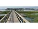 Beautiful wooden walkway leading to waterfront community at 81 Sandbar Ln # 28, Folly Beach, SC 29439