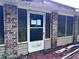 Exterior of home's entrance featuring brick decor at 838 Ranch Hill Ln, Saint Stephen, SC 29479