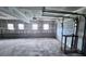 Empty garage under construction with windows at 838 Ranch Hill Ln, Saint Stephen, SC 29479