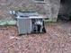 Old HVAC equipment sits on a bed of leaves at 838 Ranch Hill Ln, Saint Stephen, SC 29479