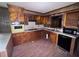 This kitchen features wood cabinets and modern appliances at 838 Ranch Hill Ln, Saint Stephen, SC 29479