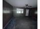 The living room features paneled walls and a ceiling fan, creating a cozy atmosphere at 838 Ranch Hill Ln, Saint Stephen, SC 29479