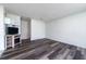 Open living room area with stylish floors, built-in cabinets, and plenty of natural light at 855 Club Cottage Rd, Edisto Island, SC 29438