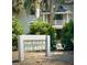 Community directional sign for Oak Grove, located at 852-859, in front of residential building at 855 Club Cottage Rd, Edisto Island, SC 29438