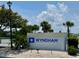 Community sign for Wyndham Ocean Ridge, a vacation ownership resort, on a sunny day at 855 Club Cottage Rd, Edisto Island, SC 29438