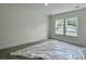 Spacious bedroom with two windows, neutral carpet and bright walls at 8629 Connor Ct, North Charleston, SC 29406