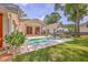 Backyard featuring a sparkling pool, lounge chairs, privacy fence, and manicured lawn at 974 Cliffwood Dr, Mount Pleasant, SC 29464