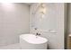 Elegant bathroom featuring a freestanding tub with brass fixtures and unique tile work at 974 Cliffwood Dr, Mount Pleasant, SC 29464