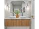 Modern bathroom with a double sink vanity featuring unique fixtures and decor at 974 Cliffwood Dr, Mount Pleasant, SC 29464