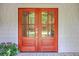 The house features a beautiful wood front door with glass panels and hardware details, adding a touch of elegance at 974 Cliffwood Dr, Mount Pleasant, SC 29464