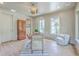 Cozy home office with hardwood floors, neutral paint, natural light, and decor at 974 Cliffwood Dr, Mount Pleasant, SC 29464