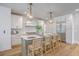 Spacious kitchen with marble countertops, an island with seating, and stainless steel appliances at 974 Cliffwood Dr, Mount Pleasant, SC 29464