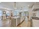 Open concept kitchen with an island flowing into the dining and living spaces at 974 Cliffwood Dr, Mount Pleasant, SC 29464