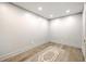 Empty room with hardwood floors, neutral walls and a decorative rug at 974 Cliffwood Dr, Mount Pleasant, SC 29464