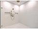 Modern bathroom shower showcasing detailed tile work and dual shower heads with gold fixtures at 974 Cliffwood Dr, Mount Pleasant, SC 29464