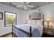 Comfortable bedroom with natural light, ceiling fan, and charming decor for a cozy retreat at 1 Cool Blow St # 153, Charleston, SC 29403