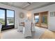 Charming dining area with seating for four, with sliding doors and a view of the exterior at 1 Cool Blow St # 153, Charleston, SC 29403