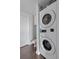 Convenient laundry area with stacked washer and dryer units, offering efficiency and space-saving design at 1 Cool Blow St # 153, Charleston, SC 29403