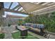 Rooftop patio with a cozy seating area, fire pit, wood pergola, and decorative stone at 1 Cool Blow St # 153, Charleston, SC 29403